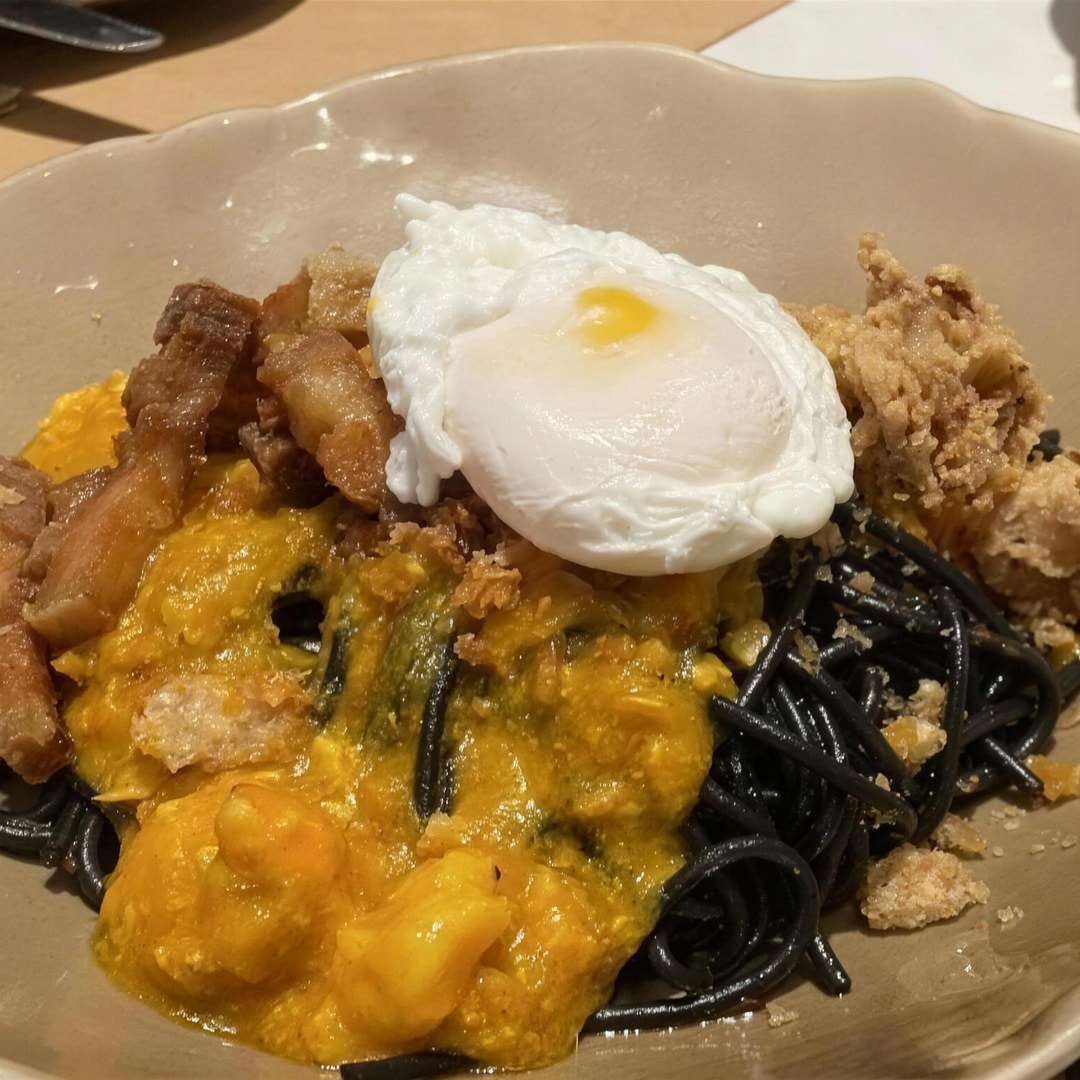 Cacao Smoked Black Palabok with poached egg